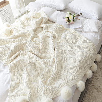 PLAID BOHEME TRICOTE A POMPONS  – DOUCEUR ET CONFORT
