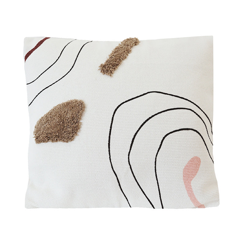 COUSSIN DECORATIF AVEC MOTIFS ABSTRAITS CAPITONNES